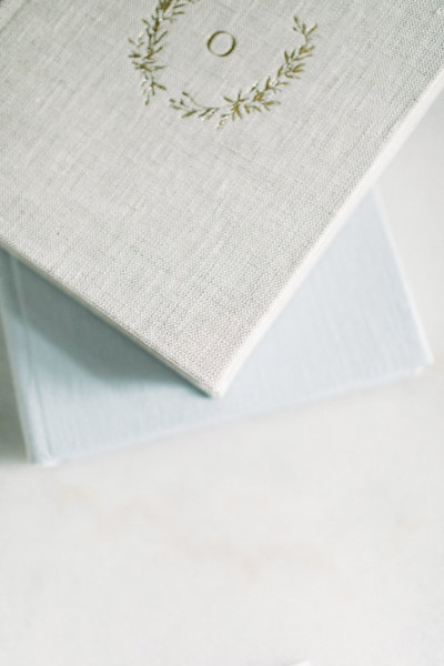 An heirloom family album cover in gray linen.