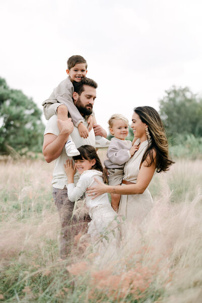 fort lauderdale family photographer beach and nature session at sunset, playful natural family portraits in south florida