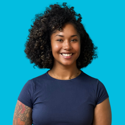 Drop-in/Case Manager of Move Forward who is a black woman with curly dark hair and a navy shirt