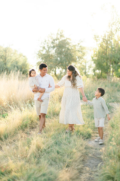 Outdoor family portrait session in Utah, capturing natural moments of joy, by Kamee Valdez Photo