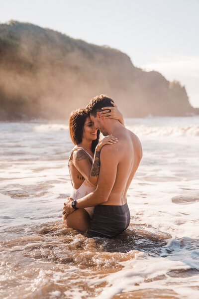 couple photo session on kauai beach in hawaii