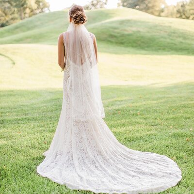 bride standing outside showing backview of hair