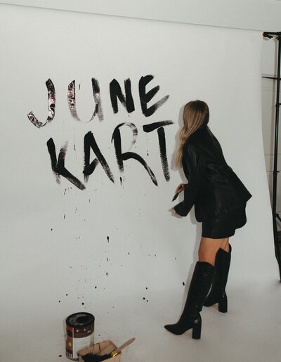 June Karter stylists hugging and laughing