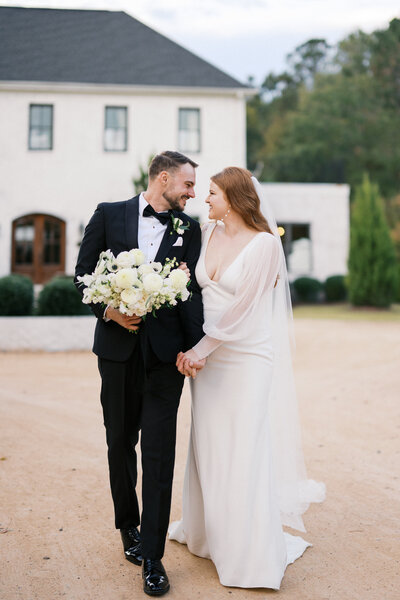 Bride and groom standing at ceremony