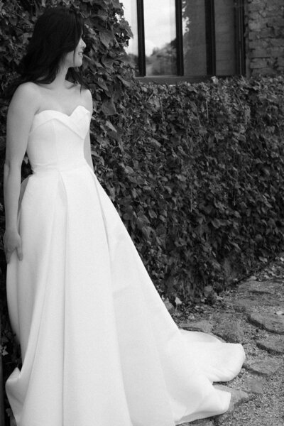 Luxury wedding in Europe – sophisticated bride in a modern wedding gown and groom in a timeless suit.
