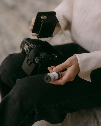 A Bend Oregon elopement photographer holding 120mm film