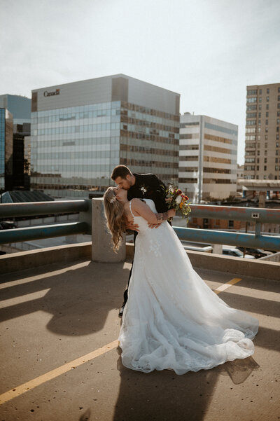 Modern Remai Rooftop wedding photos of new bride and groom