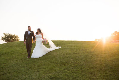 Bride and Groom in front of ceremony site at The Crossings in Carlsbad wedding venue