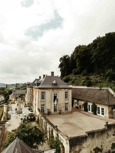 Get framed photography Chateau Neercanne wedding photography Europe international drone shot location weddingdress