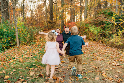 Extended family laughing in field  | Sharon Leger Photography