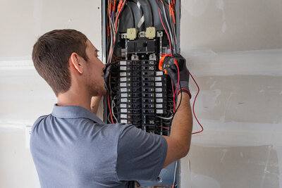 Dove Electric installing an electric panel in Albuquerque
