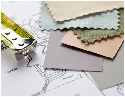 Online interior decorator choosing colour swatches for client project