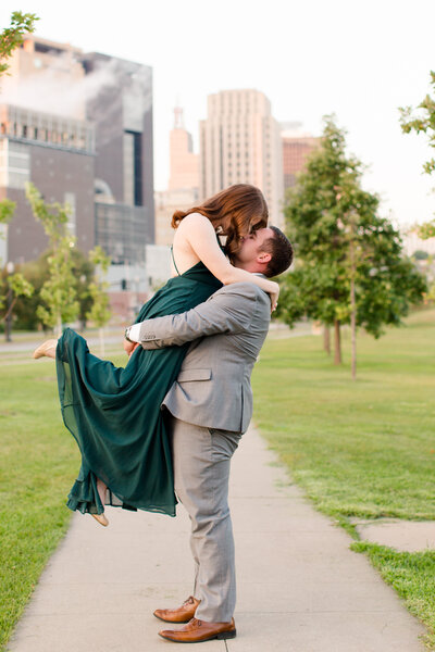 Romantic lift engagement session picture of bride and groom