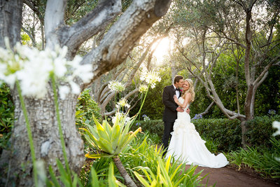 Wedding couple kissing at Rancho Valencia in San Diego