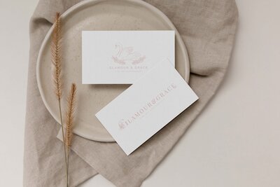 Custom Branding for a  newborn photographer with a crest with illustrated roses