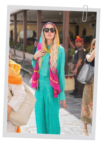 Woman wearing a stylish saree while traveling in India