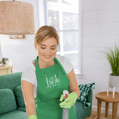 Fresh Nest Green Cleaning technician detailing bathroom sink with natural cleanser in Edmonton home