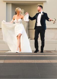 Fiona & Valentin walking holding hands and gazing at each other