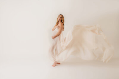 Expectant parents pose for Maternity Photos at Magnolia Gardens in Charleston, South Carolina.