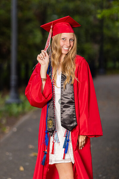 A University of South Carolina student taking his senior portraits on campus