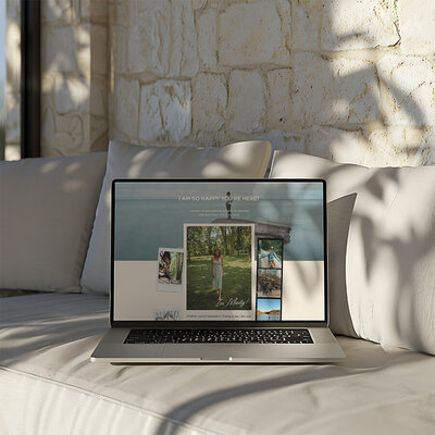 A laptop resting on a cozy couch, perfect for a travel blogger's creative workspace.
