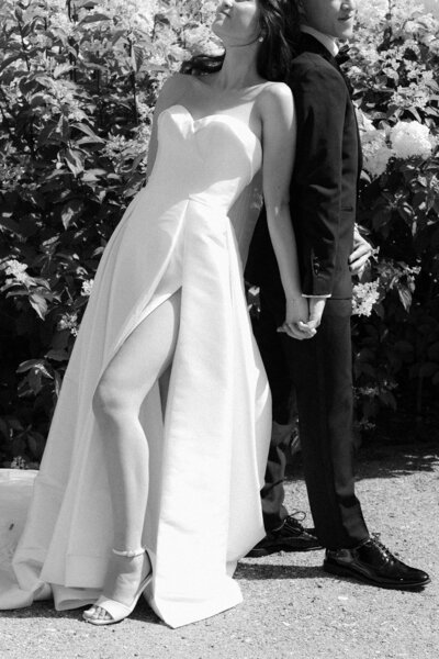 Luxury wedding in Europe – sophisticated bride in a modern wedding gown and groom in a timeless suit.