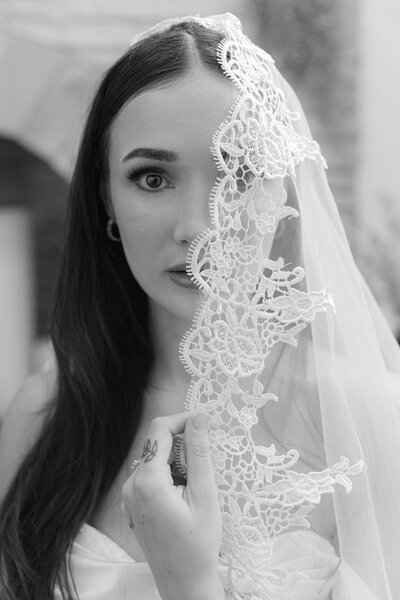 Editorial black and white bridal portrait with a lace veil at Villa Parker, a european-inspired colorado wedding venue.
