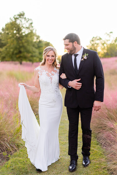 Grassy field bride and groom portraits at Georgia wedding