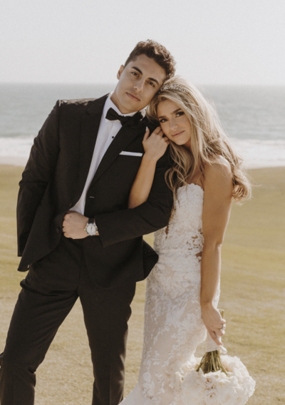 Bride and groom walk up memorial steps at their DC wedding