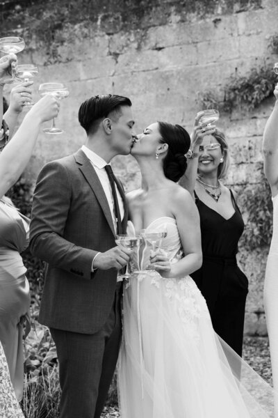 Get framed photography Chateau Neercanne wedding photography Europe international cheers briding couple