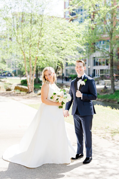 bride and groom photos in Falls Park Greenville