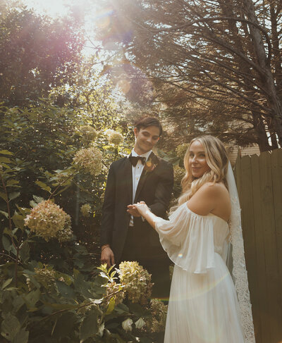 Bride and groom holding hands during a wedding ceremony in Georgia