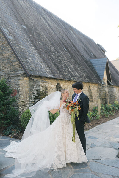 A gorgeous timeless wedding at the Bradford in Raleigh North Carolina with mismatched bridesmaids dresses.