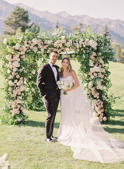 A fabulous floral arch against a gorgeous mountain backdrop, you can't get much better than that!