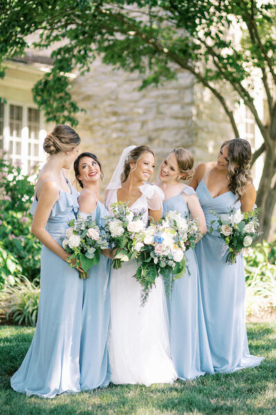 Bridesmaids in slate blue at the Farm at Eagles Ridge in Lancaster