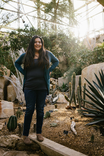 San Antonio Photographer Irene Castillo posing with succulents for instagram picture @irenesplanit