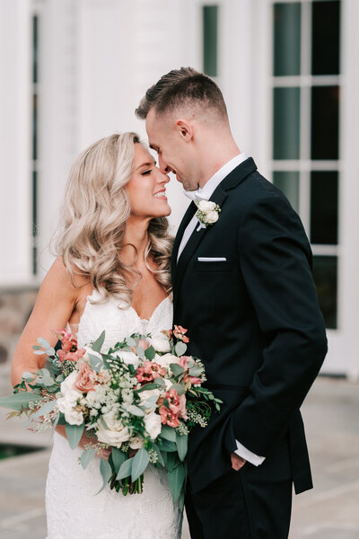 A lovely couple having fun during their Longwood Gardens engagement session