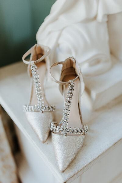 a detail photograph of a bride's wedding shoes as she gets ready in charlotte nc