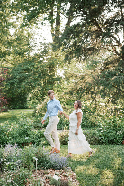 newlyweds walking in garden