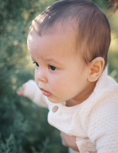 Natural curiosity of this little one can be seen in this image. Photography by LV Hughes. Serving Bainbridge, GA, Tallahassee, FL & surrounding areas. 