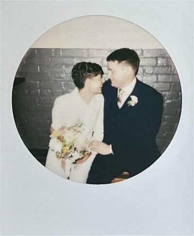 Polaroid photo of bride and groom getting married in Pawtucket, Rhode Island. Photo by Rhode Tripper Photography