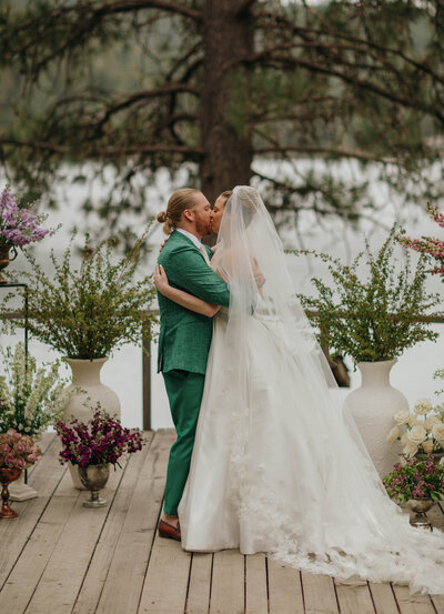 couple first kiss on wedding day