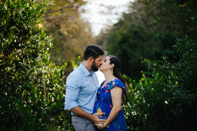 Portrait of Pregnant Couple Kissing in Asheville