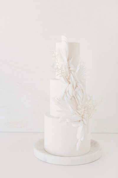 Beautiful white on white wedding cake