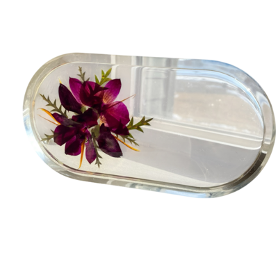funeral flowers preserved in resin in the shape of a soap dish