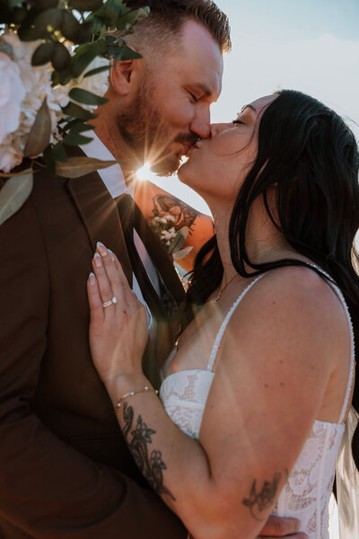 bride and groom kissing
