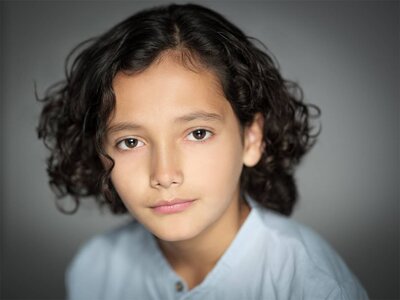 Professional NJ child headshot with natural studio lighting by Alex Kaplan Photography