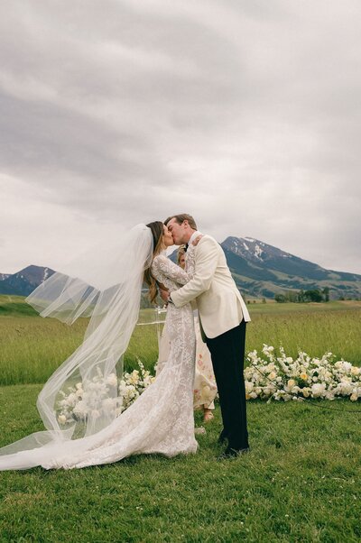 bride and groom kissing
