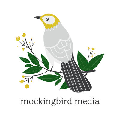 A cartoon mockingbird sits on a branch filled with green leaves, ockingbird Media.