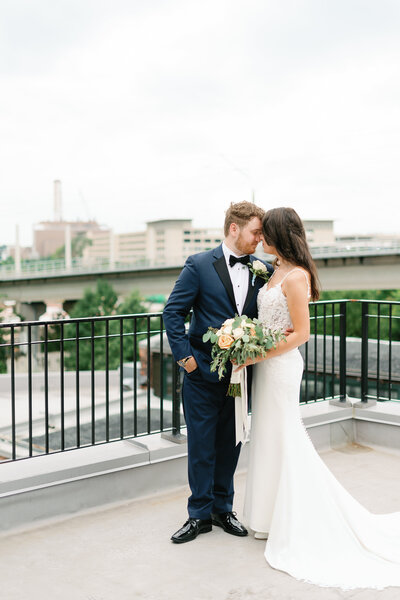 Bride and groom posing at winslow baltimore